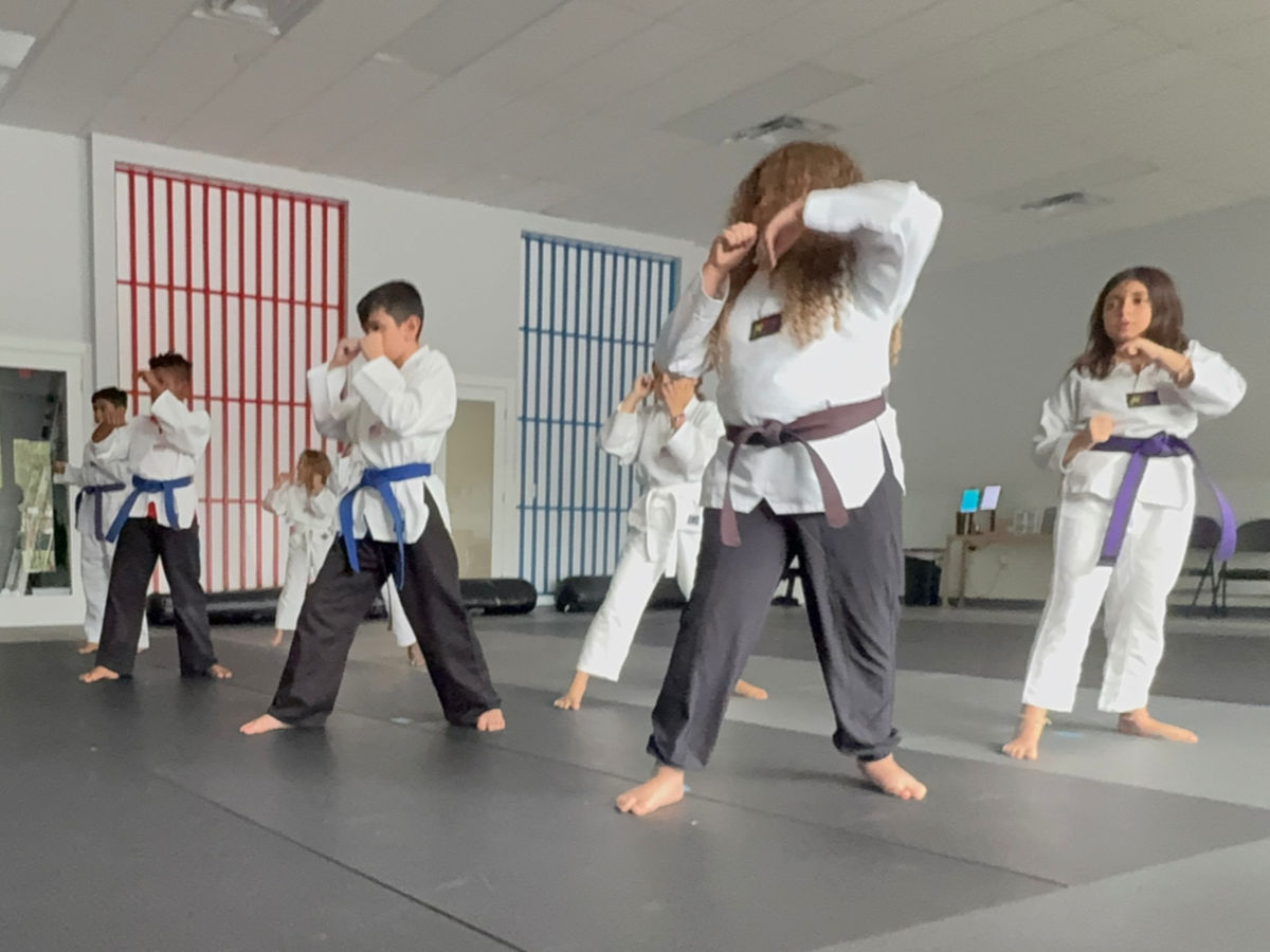 Kids martial arts class ages 6 to 12 at Empower Martial Arts Academy Lake Worth