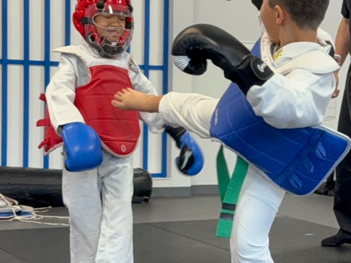 Adult and family kickboxing class at Empower Martial Arts Academy in Lake Worth FL
